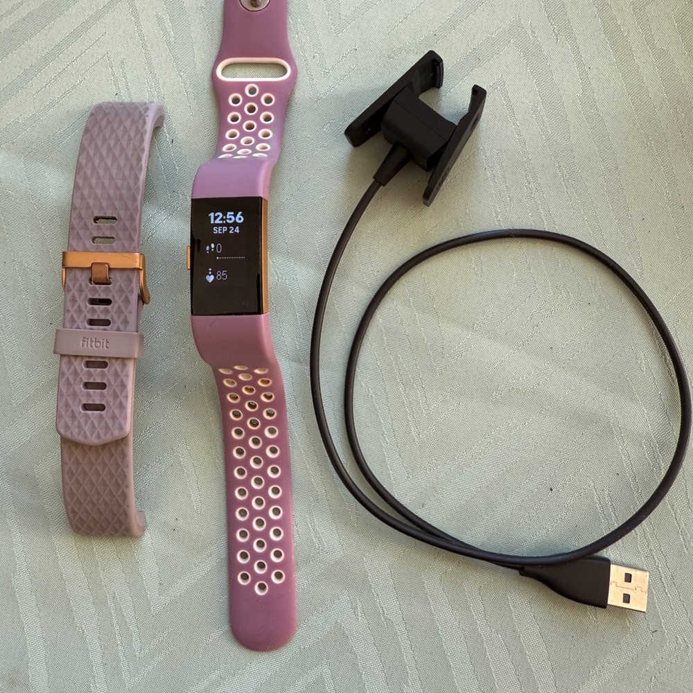 Fitbit Purple Smartwatch with Charger and Extra Band